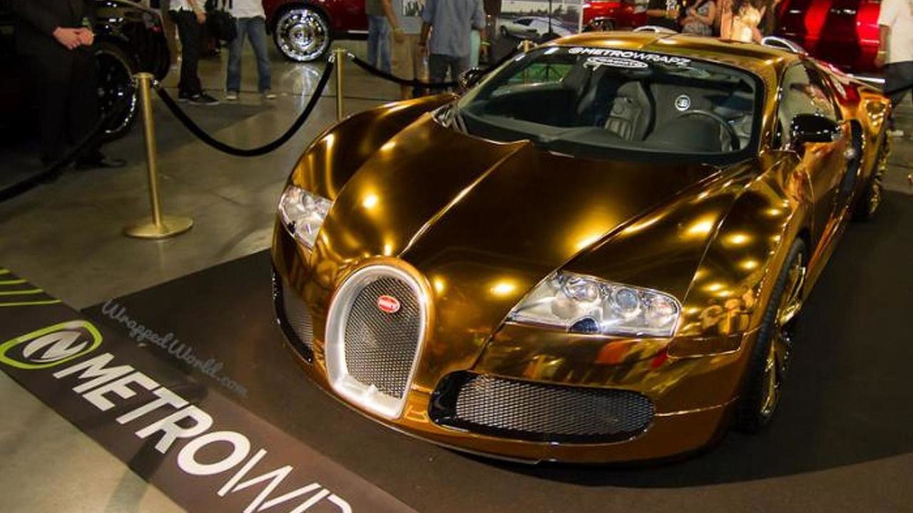 Flo Rida’s Gold Bugatti Veyron at a car show