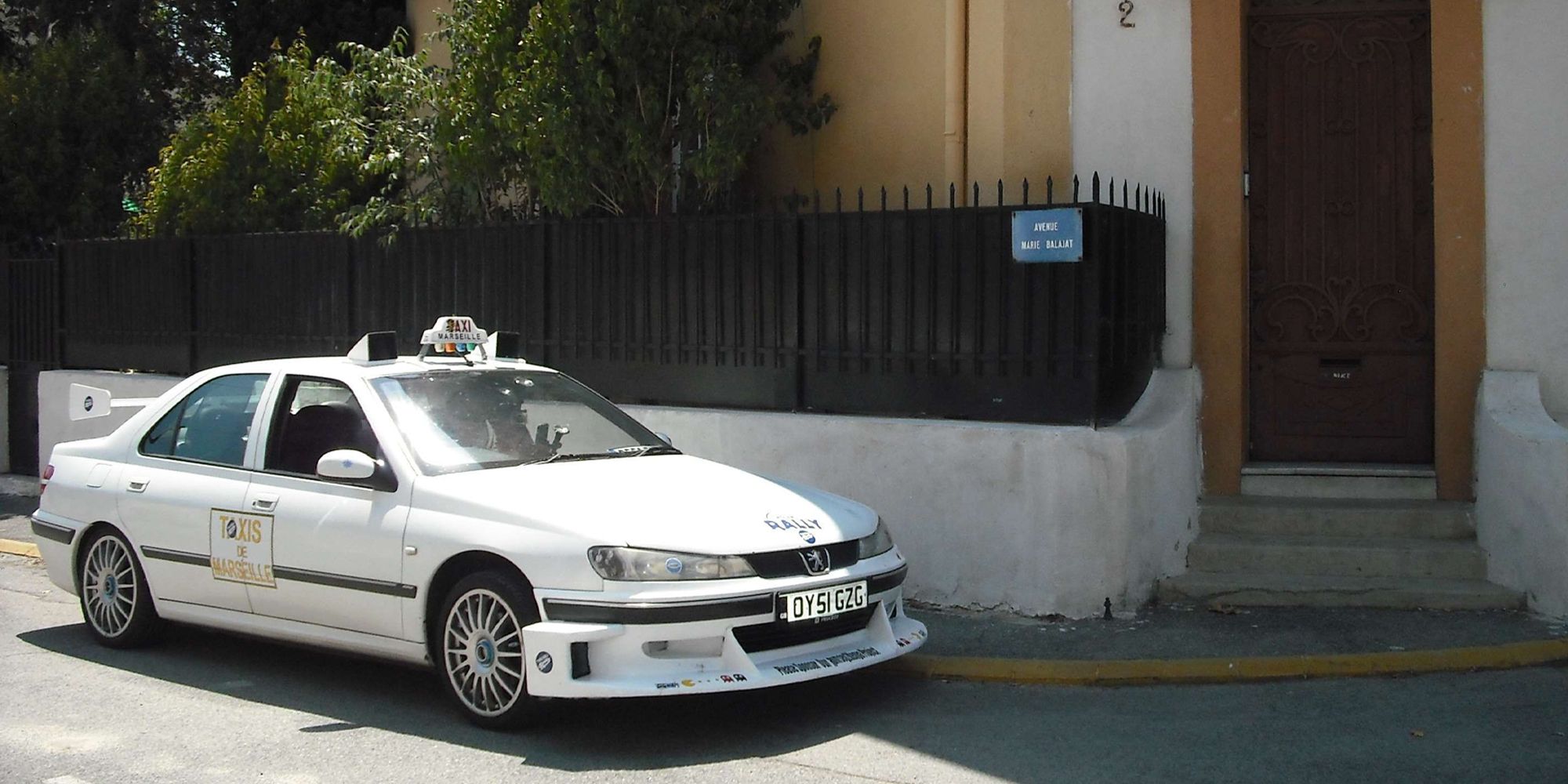 Side View Of White Peugeot 406 From French Taxi Movie 1998