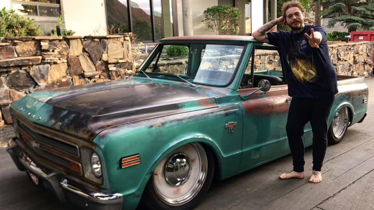 Post Malone poses with his custom built Chevrolet C10