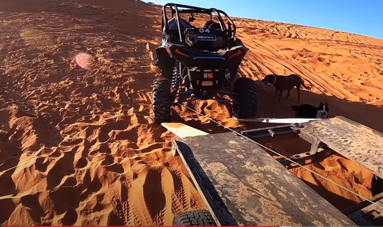 RZR winched and pulled up flatbed