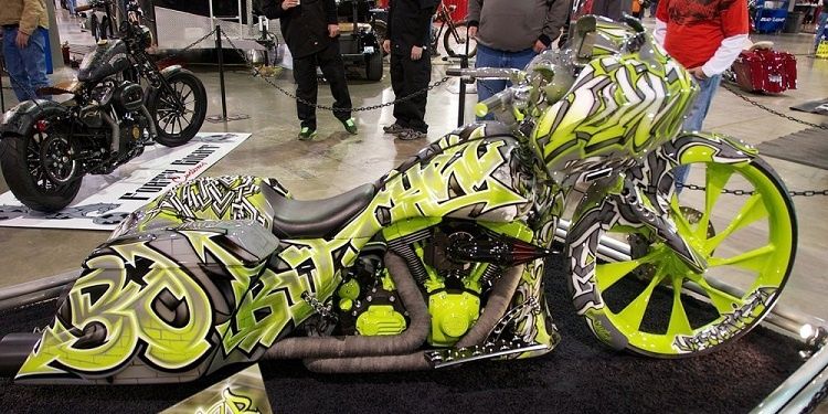 The Green Grafiti By Camtech Custom Baggers Parked At An Auto-Show