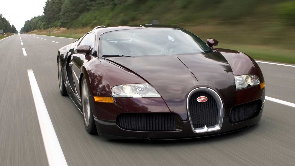 Maroon Bugatti Veyron At Speed
