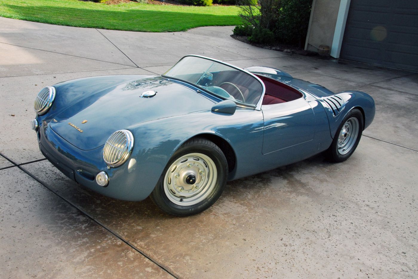 1955 Porsche 550 Spyder parked outside