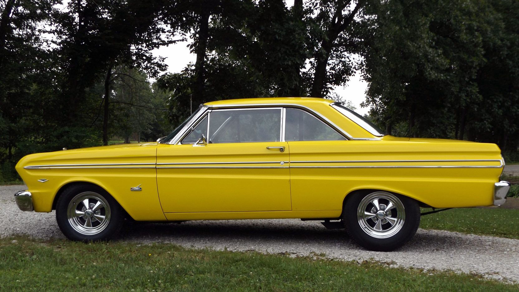 1965 Ford Falcon Sprint parked outside