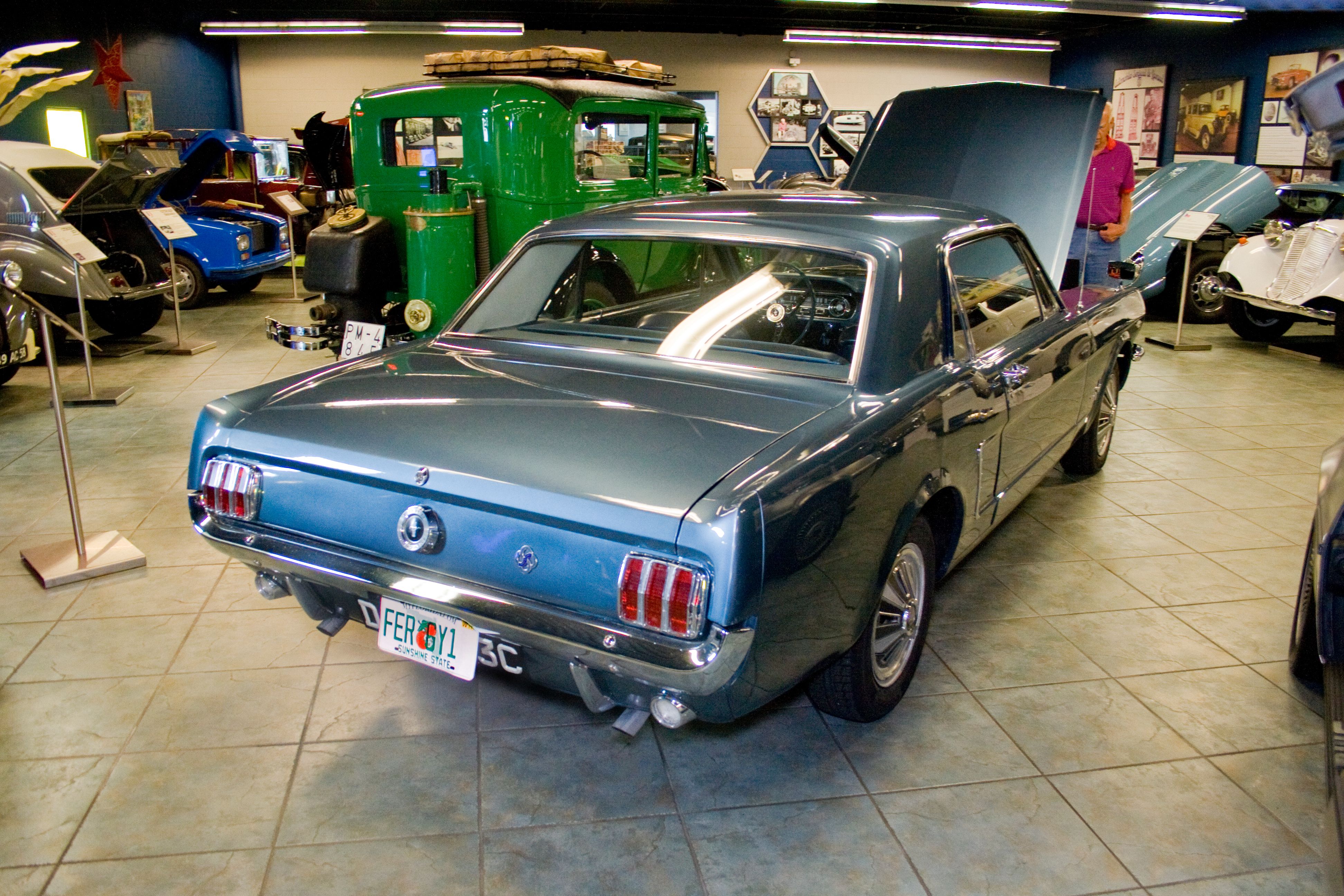 1965 Mustang AWD inside a showroom