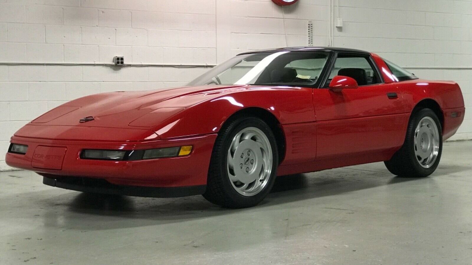 red 1991 Chevrolet Corvette ZR-1 in a parking