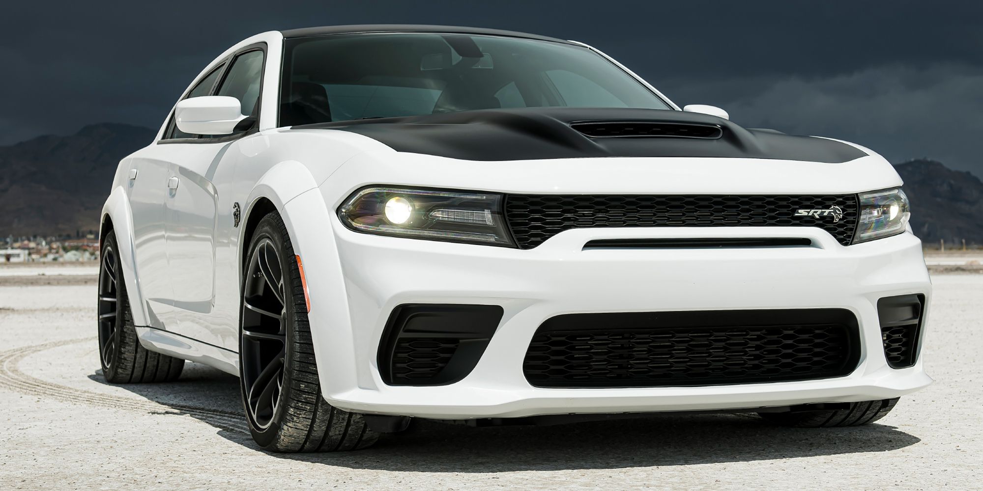 A white Charger Hellcat Widebody