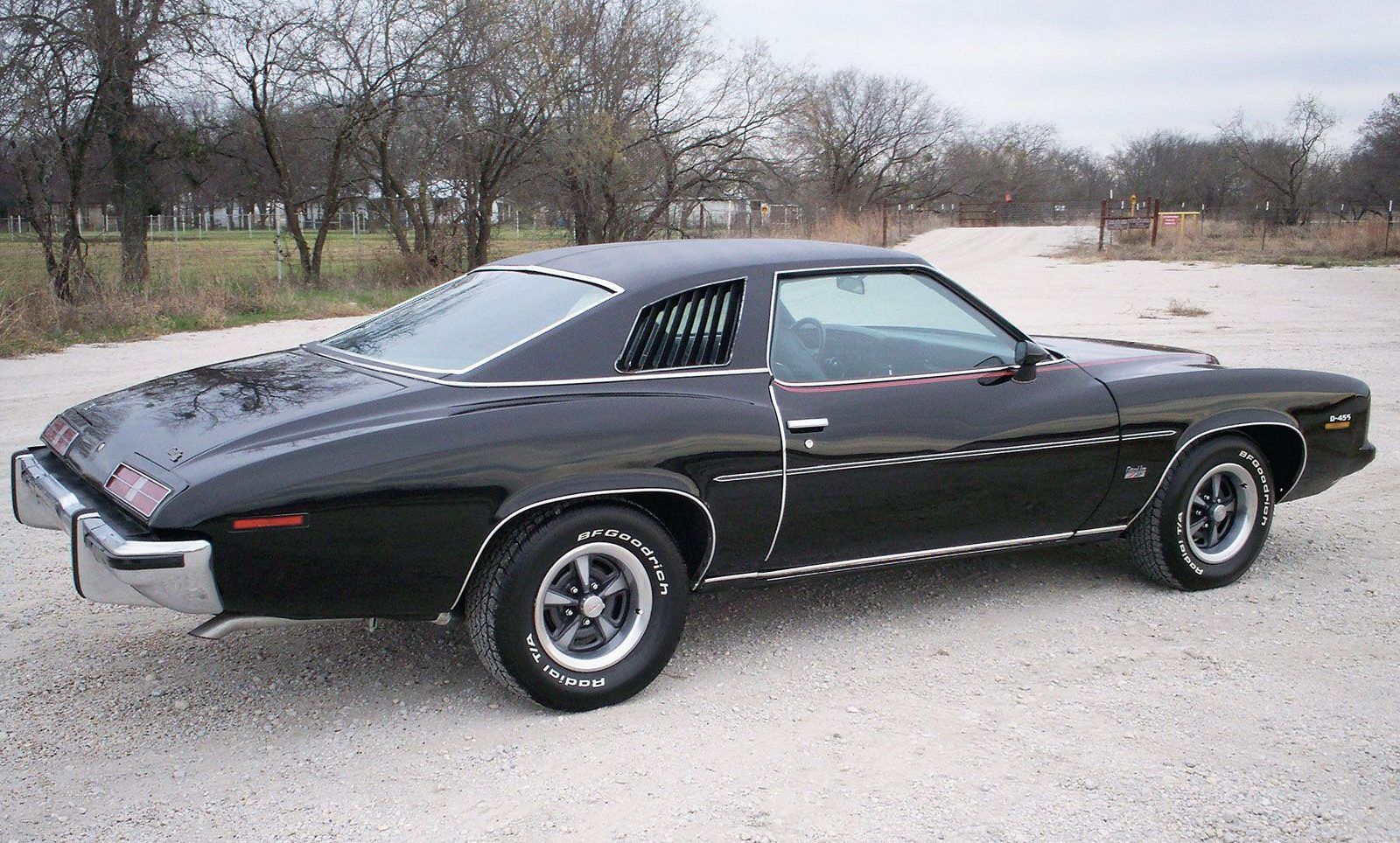 Black 1973 Pontiac Grand Am parked