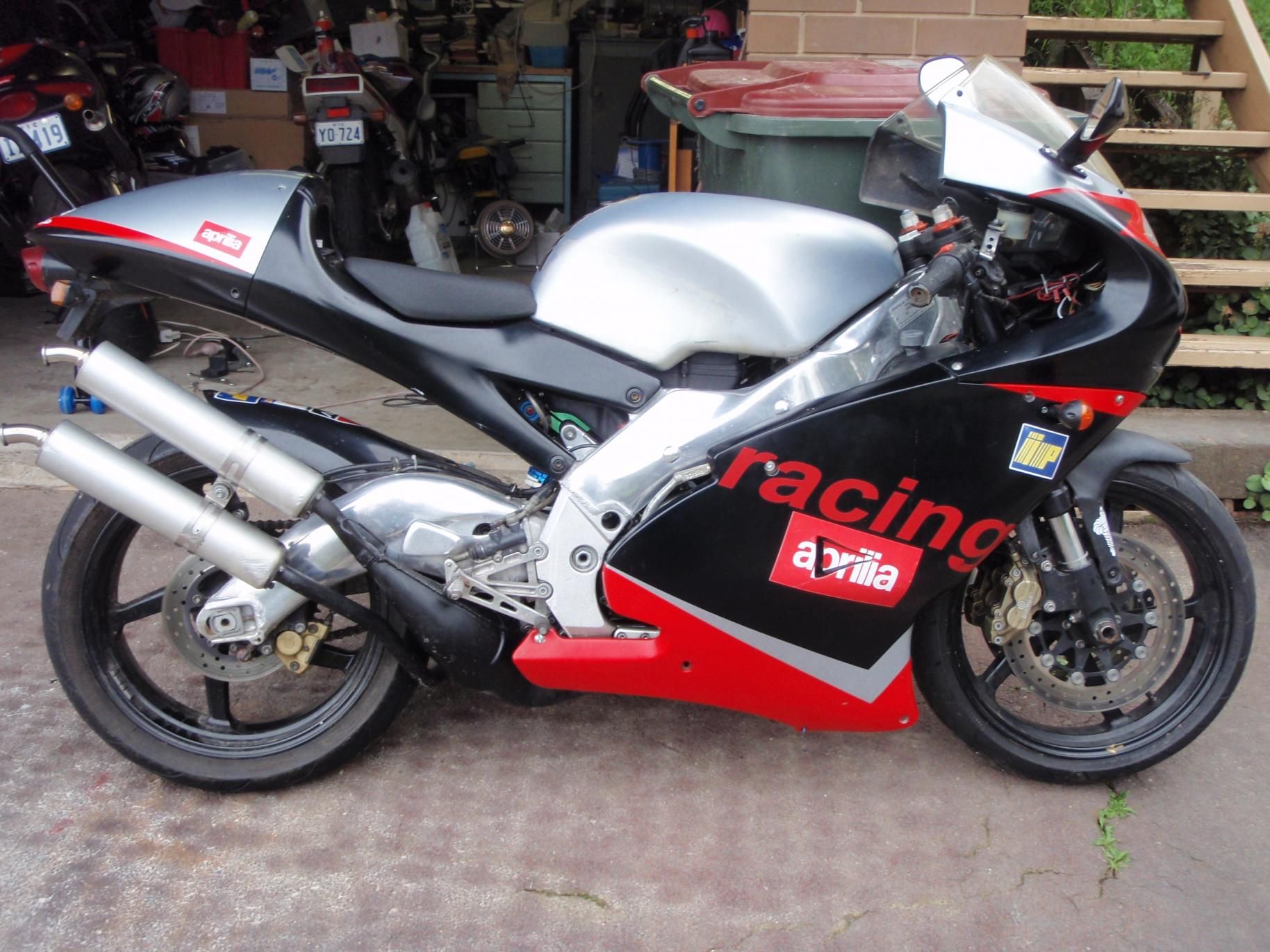Aprilia RS250 parked on the road