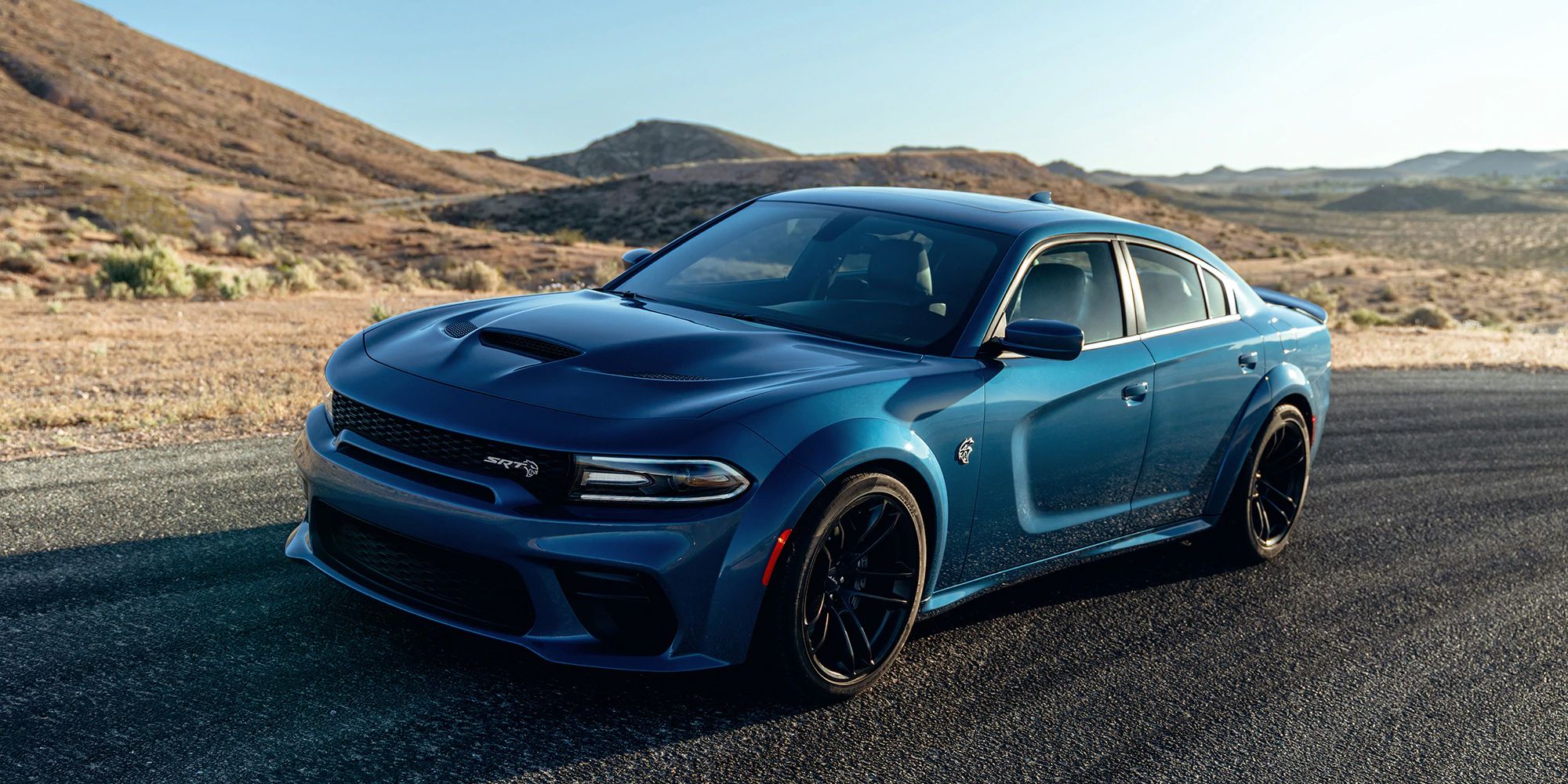 A blue Charger Hellcat, left 3/4 view