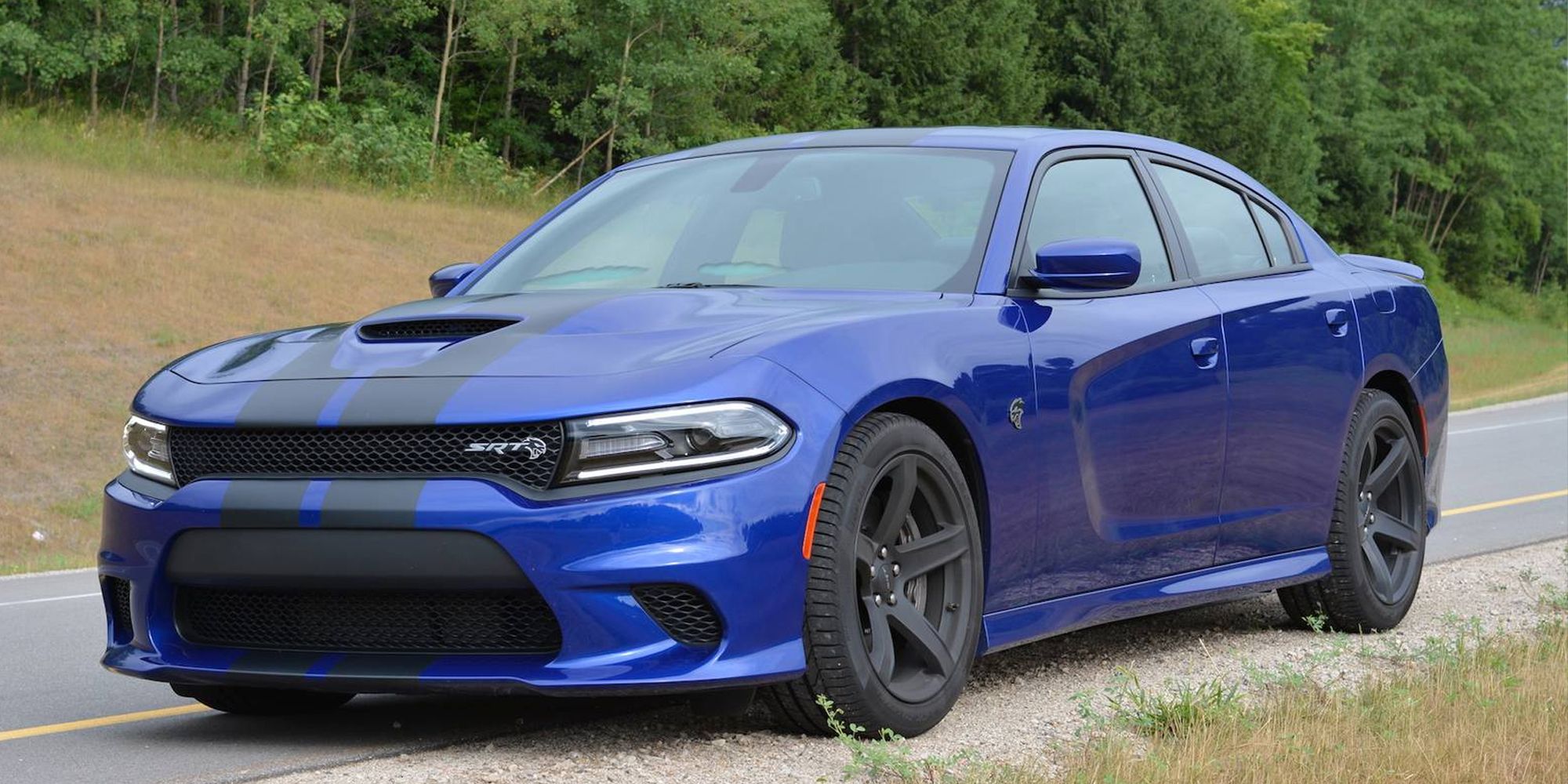 A blue Charger Hellcat with black stripes