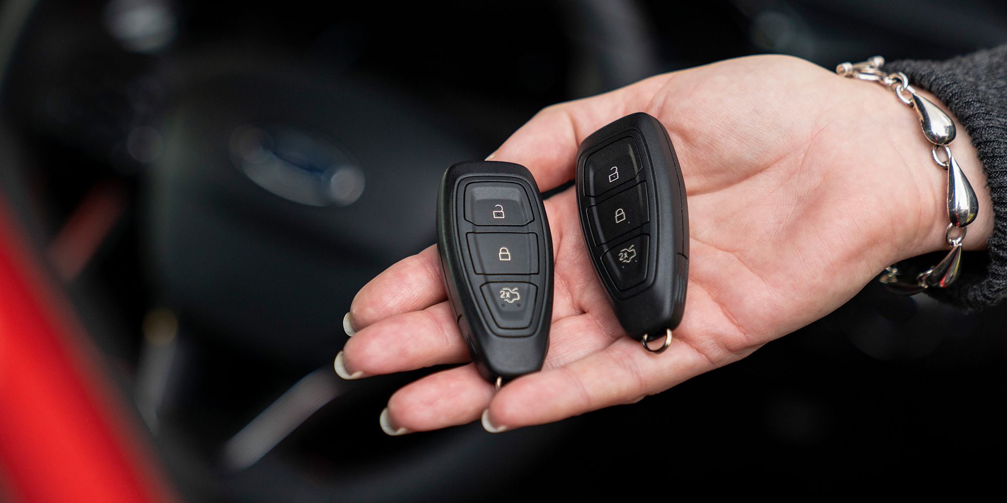 Two Ford remote key fobs