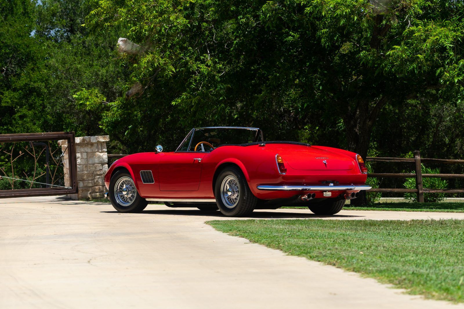 The back of a red Modena GT Spyder, the car used in the movie Ferris Bueller's Day Off.