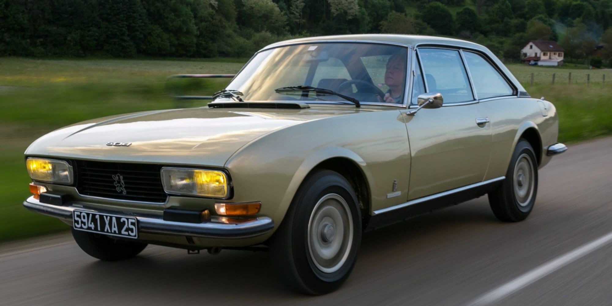 The Peugeot 504 Coupe on the move