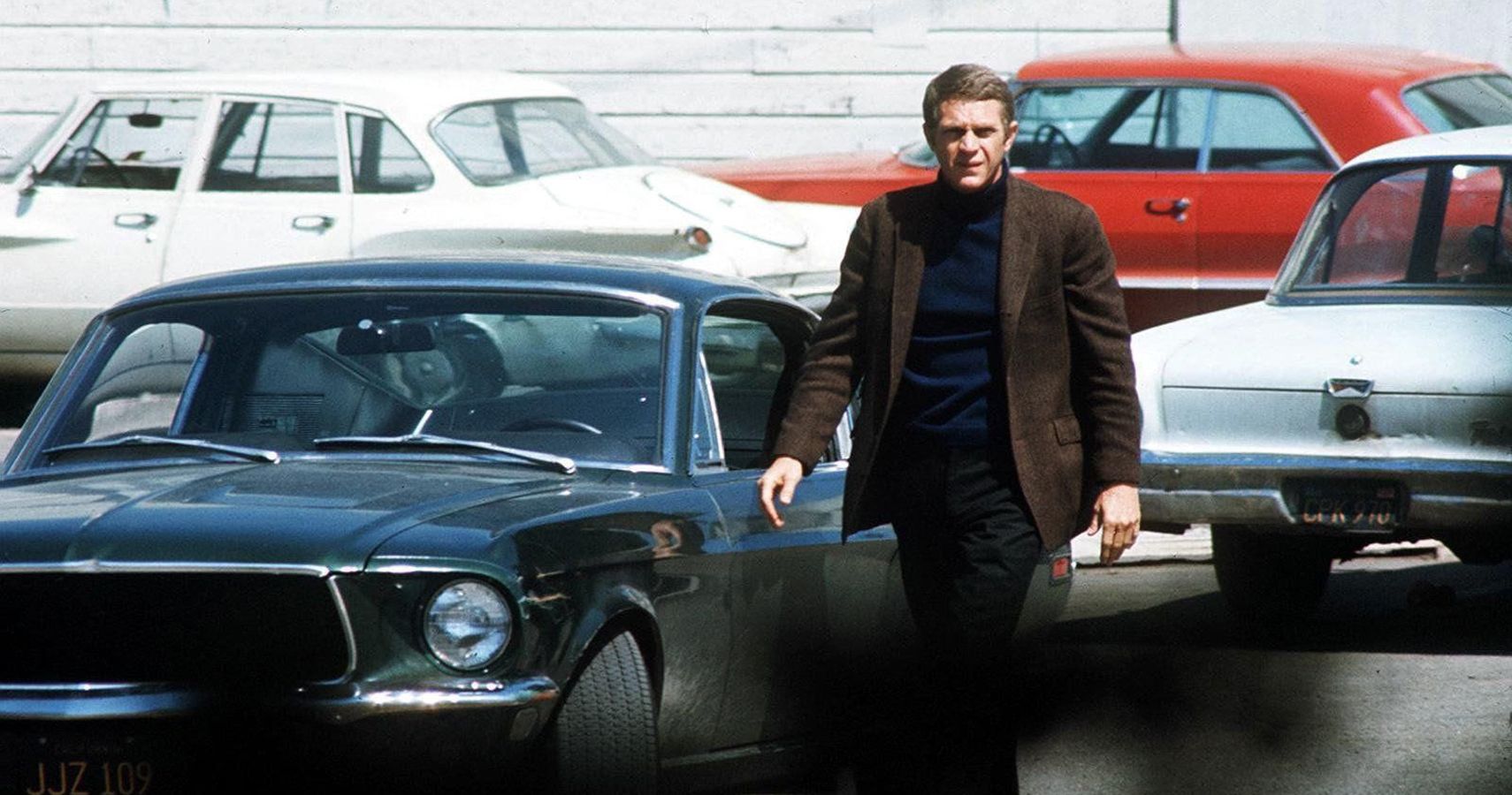 Steve McQueen with his Ford Mustang in Bullitt