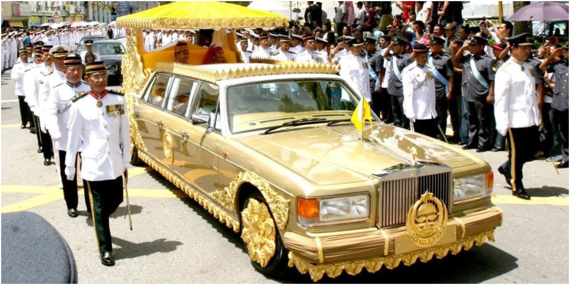 royal escort of Sultan of Brunei in his Rolls Royce Silver Spur Limo