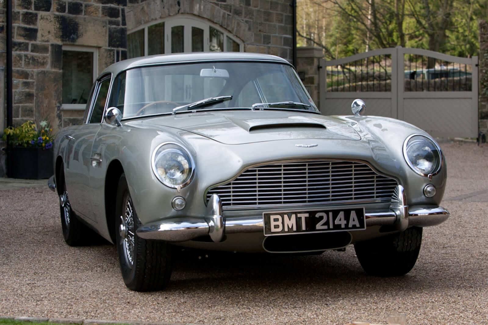 Silver DB5 parked in a courtyard