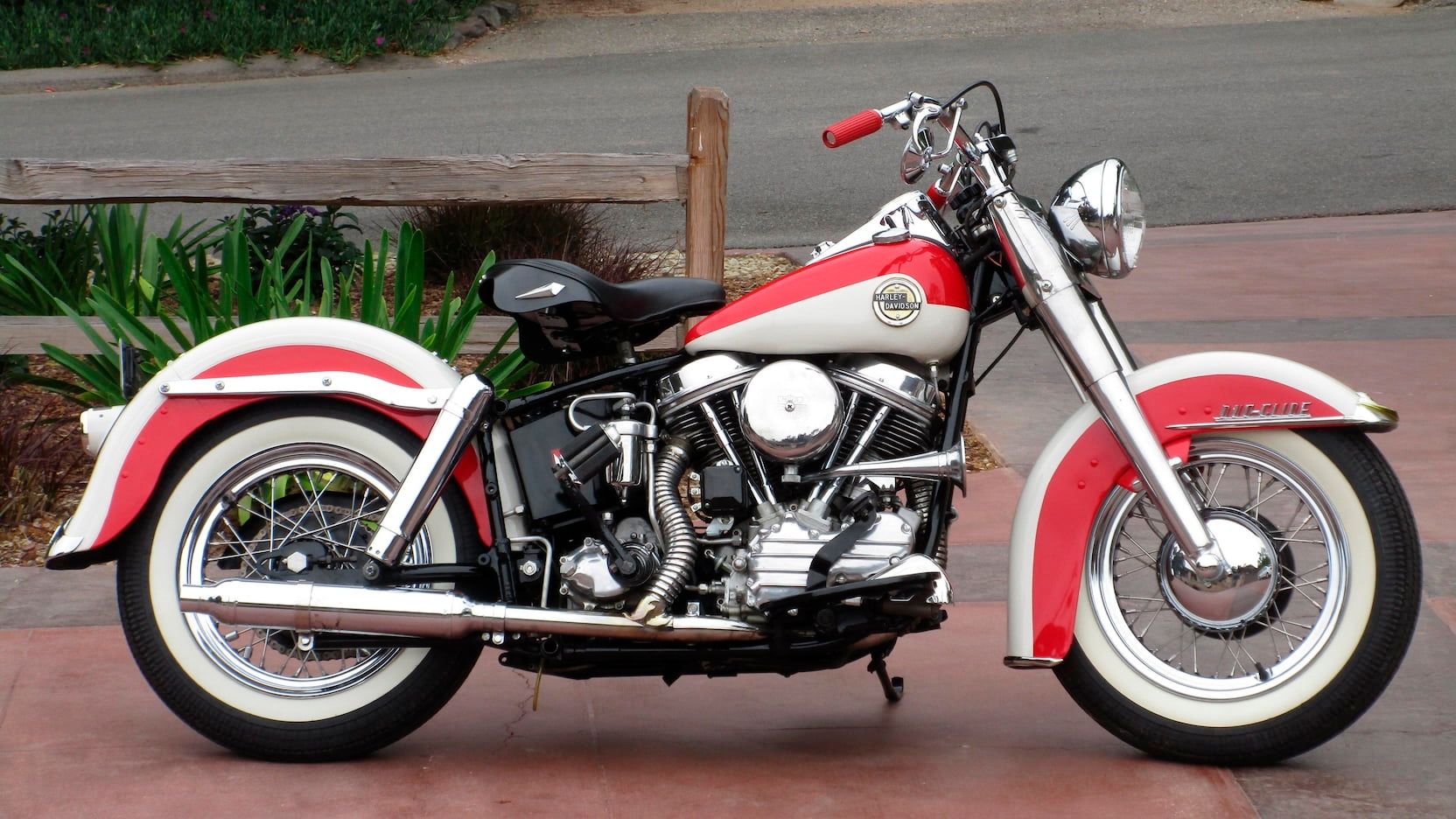 1958 Harley Davidson Duo-Glide parked outside