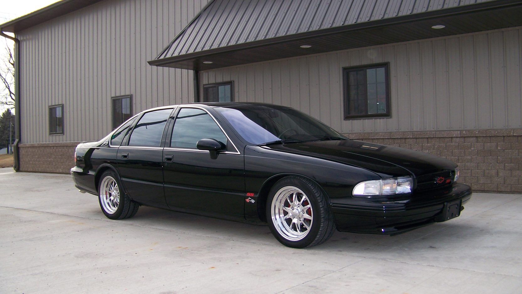 Black 1994 Chevrolet Impala SS Parked