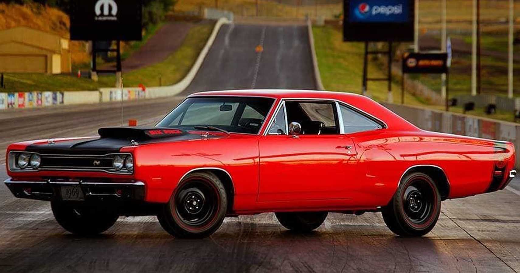 1969 Dodge Super Bee A12 parked on a drag strip