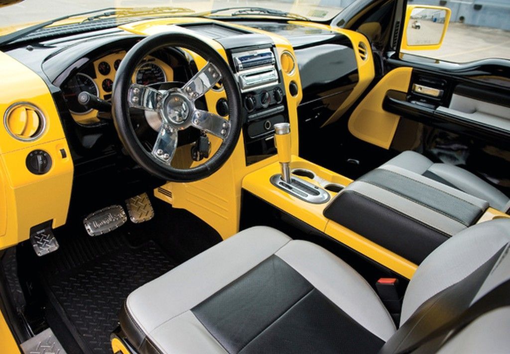 Black and yellow interior of the Ford F-150 Tonka truck