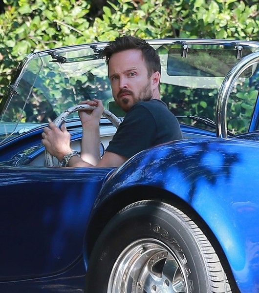 Aaron Paul driving a classic shelby cobra