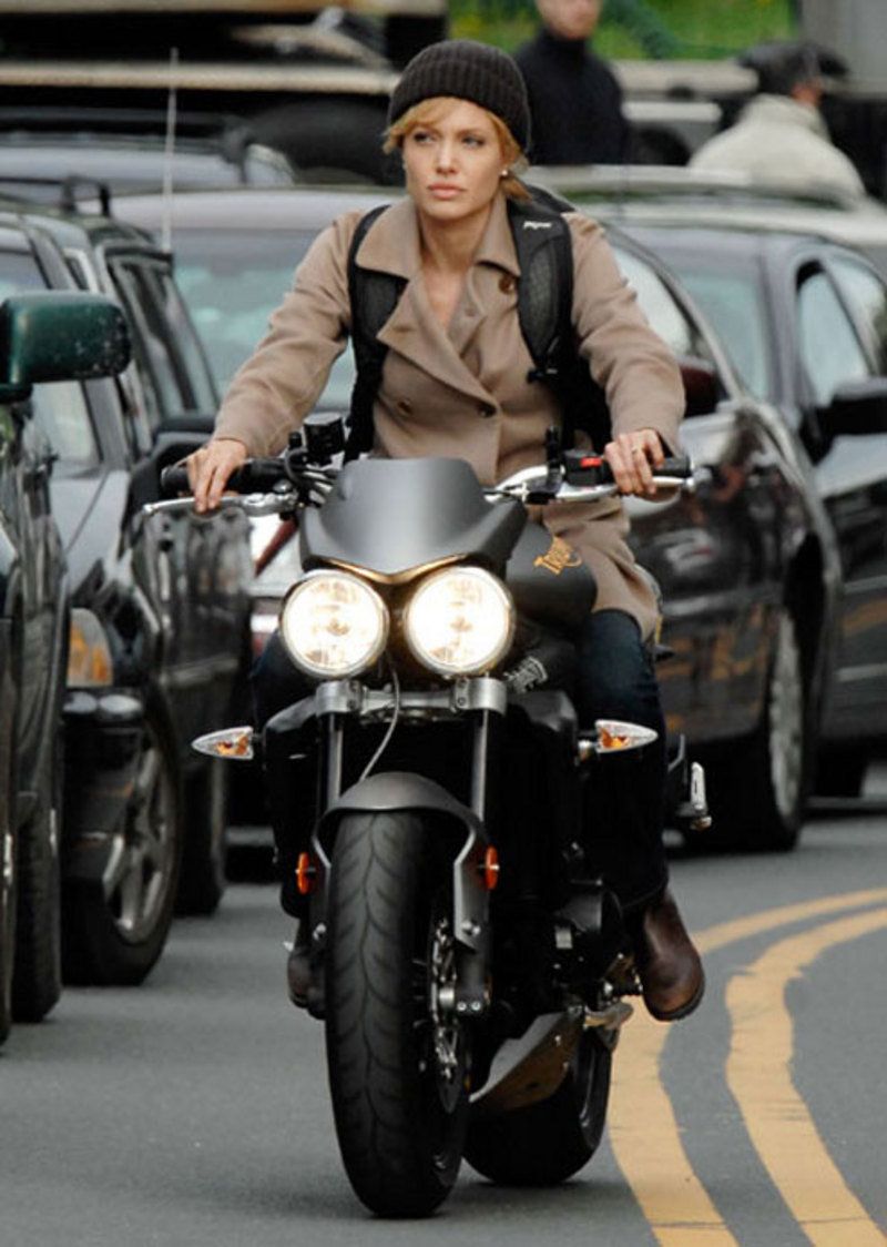 Angelina Jolie riding a bike