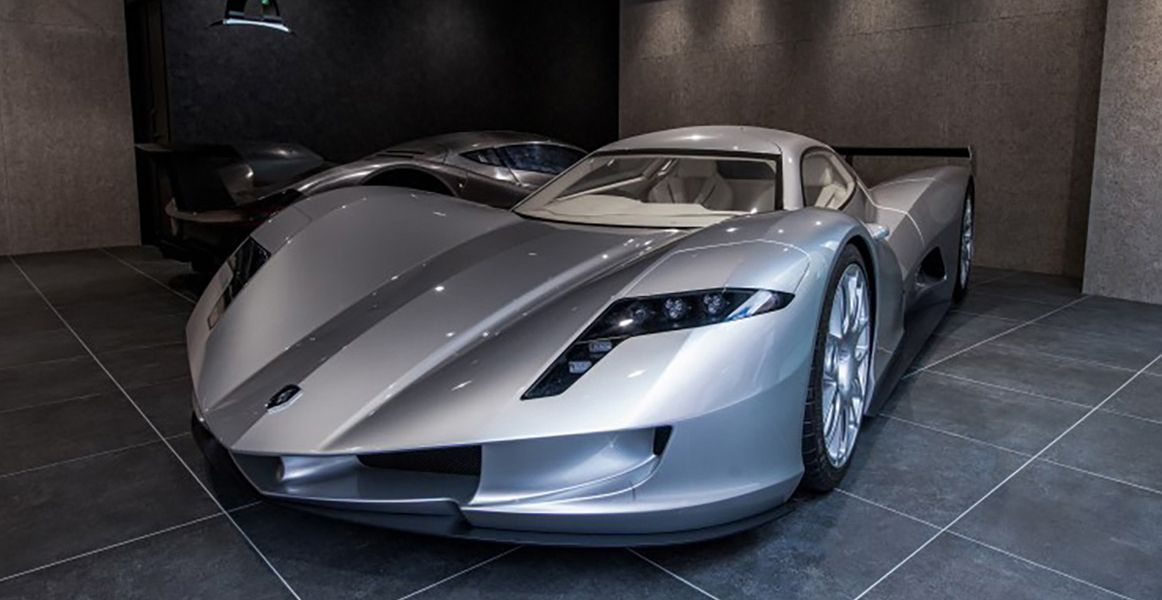 Aspark grey hypercar The Owl parked in showroom