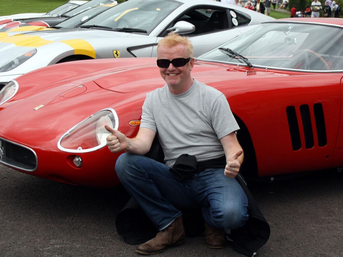 Chris Evans possing for a photo with his car