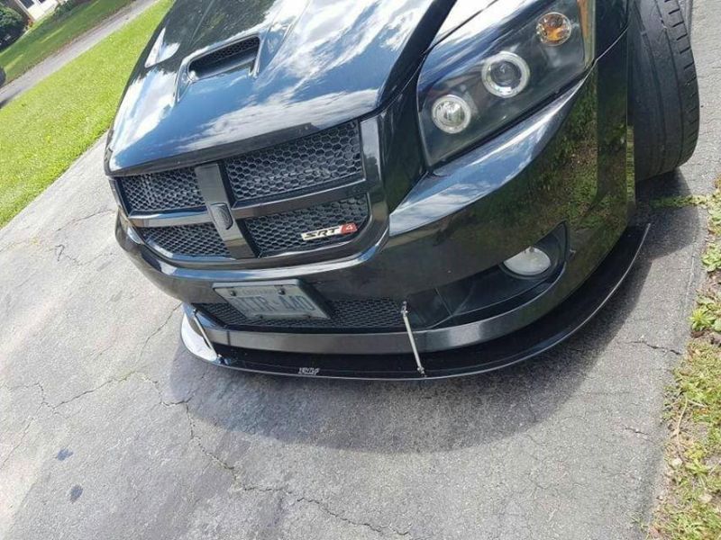 A Dodge Caliber front end splitter is designed to provide a proper angle that enforces a maximum sufficient downforce over your front end.