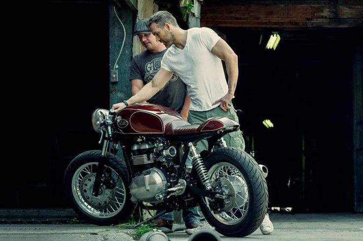Ryan Reynolds with a bike