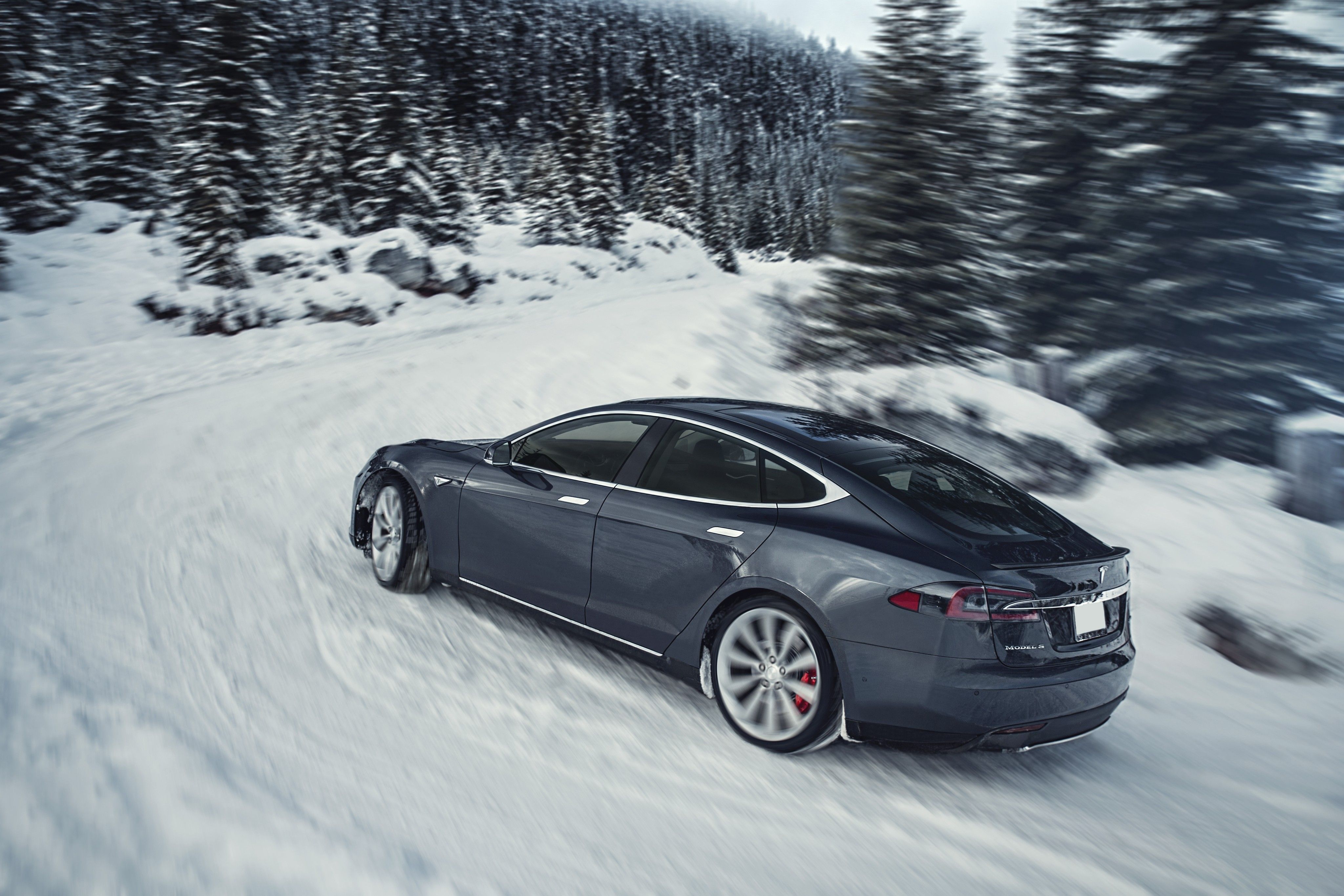Tesla Model S driving in snow