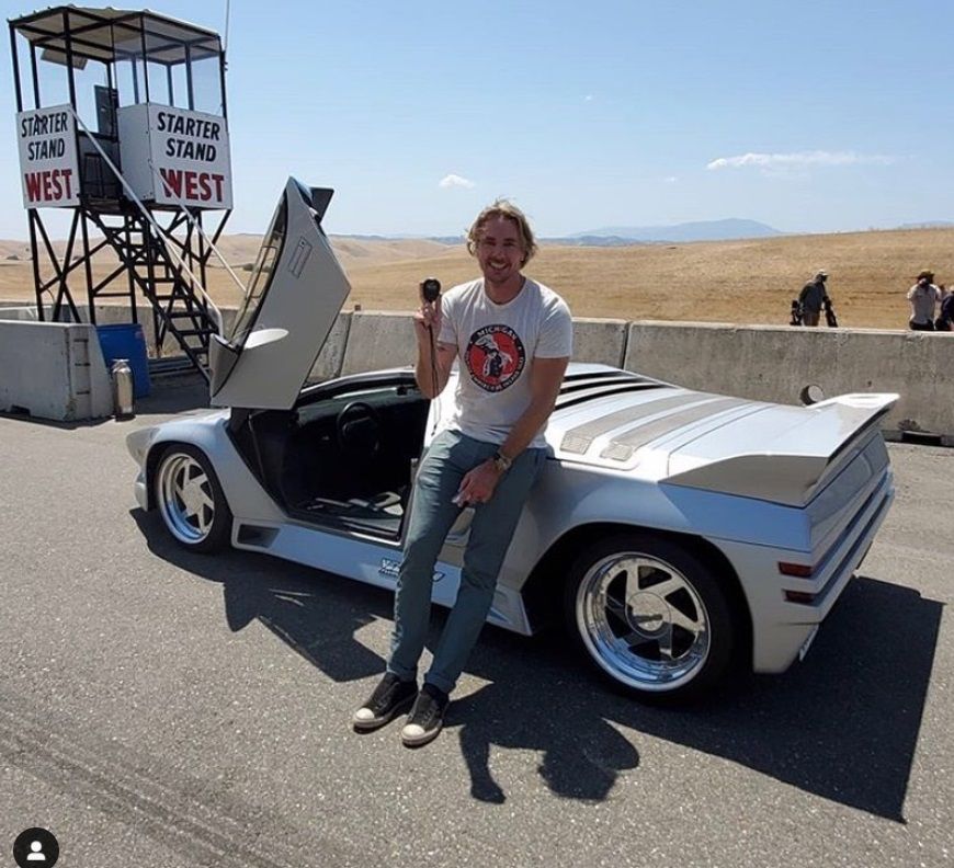 Dax Shepard poses for a picture while filming for Top Gear America.