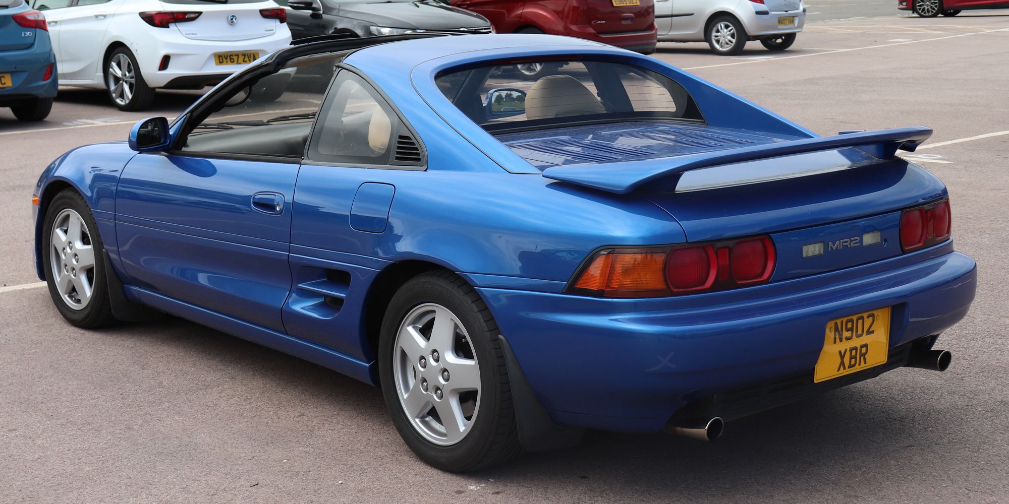 The rear of a blue SW20 MR2