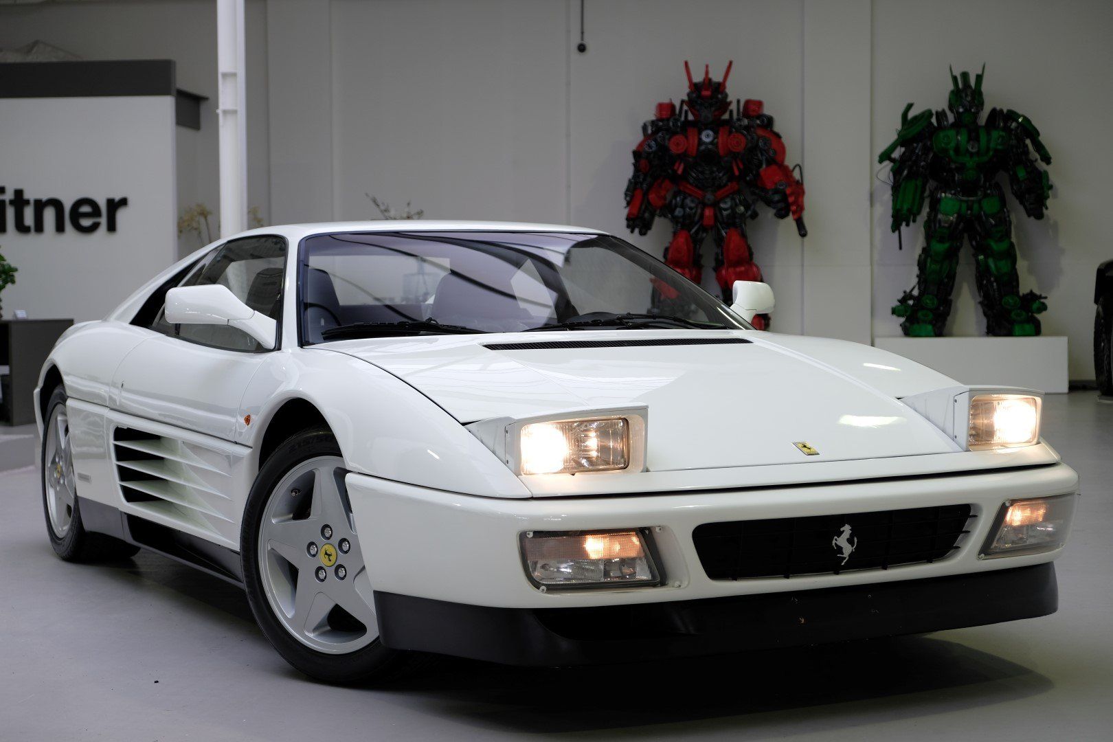 white Ferrari 348 TB