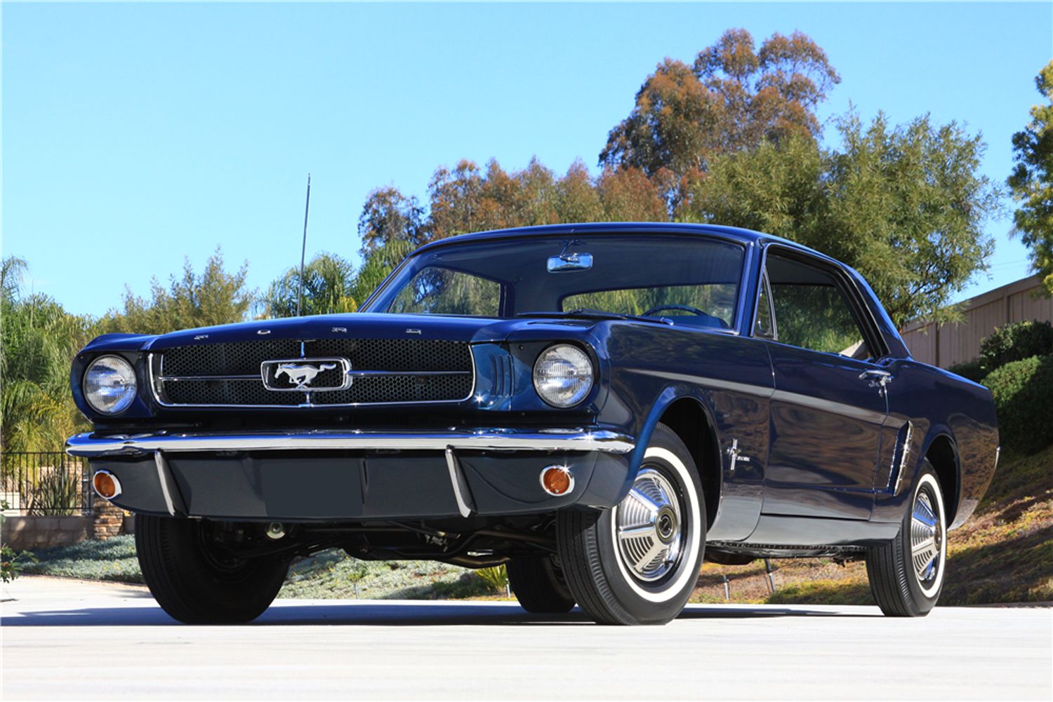 Navy Blue 1964 Ford Mustang Parked Outside