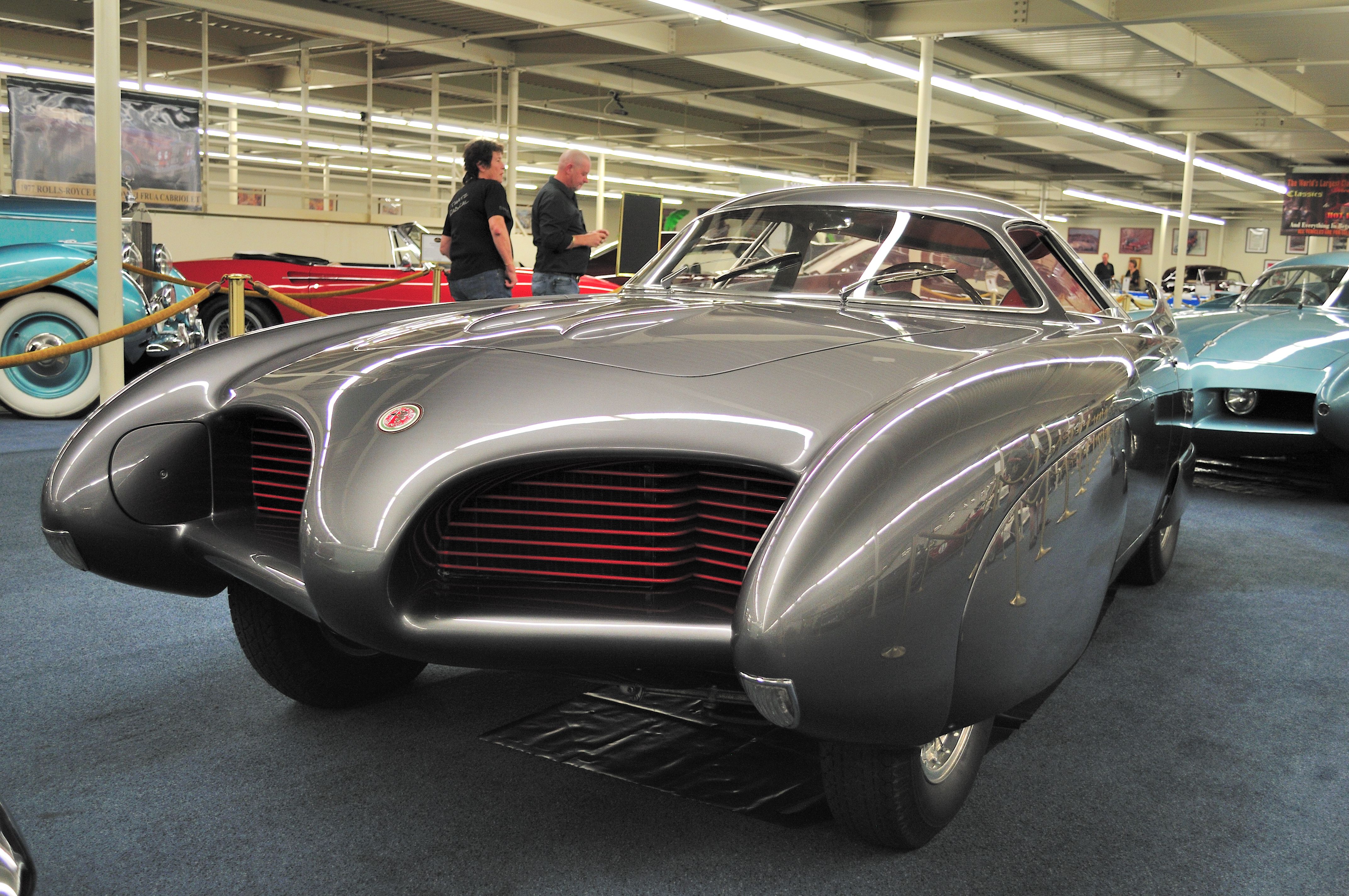 BAT5 was the first of the Bertone-Alfa Romeo BAT project. It was first shown at the Turin Auto show in 1953. The design of the model was based on a study of aerodynamics. The shape of the front in fact aims to eliminate the problem of airflow disruption at high speeds. The design also aims to do away with any extra resistance generated by the wheels turning, as well as achieving a structure which would create the fewest possible air vortices. In practice these rigorous criteria would allow the c