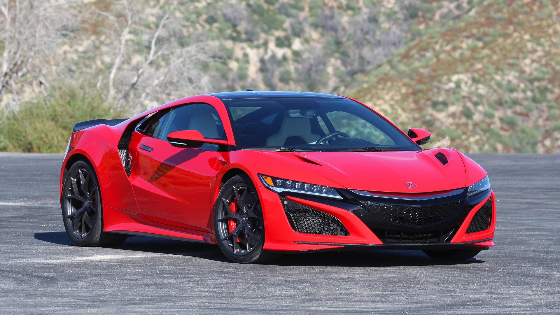 a parked red Acura NSX