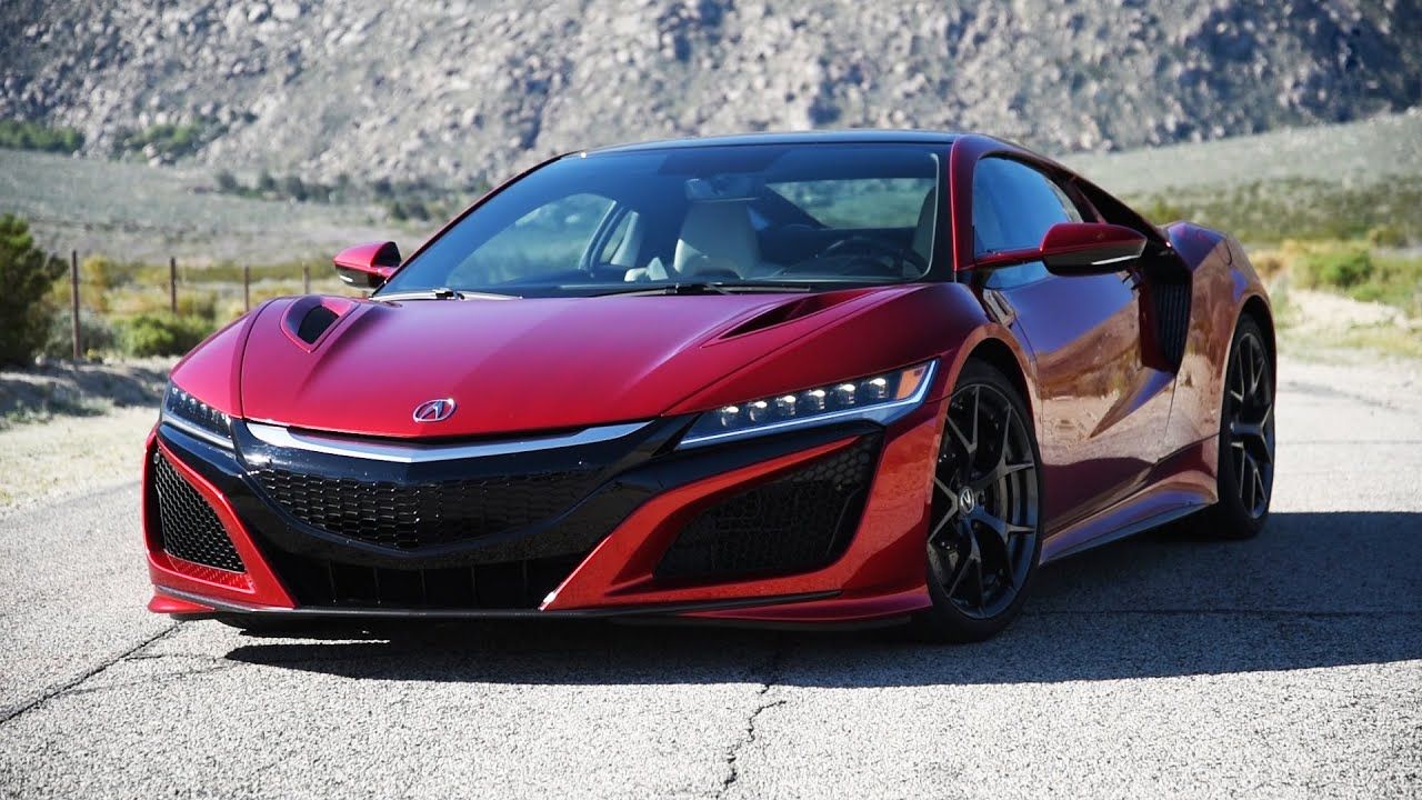 a parked red Acura NSX