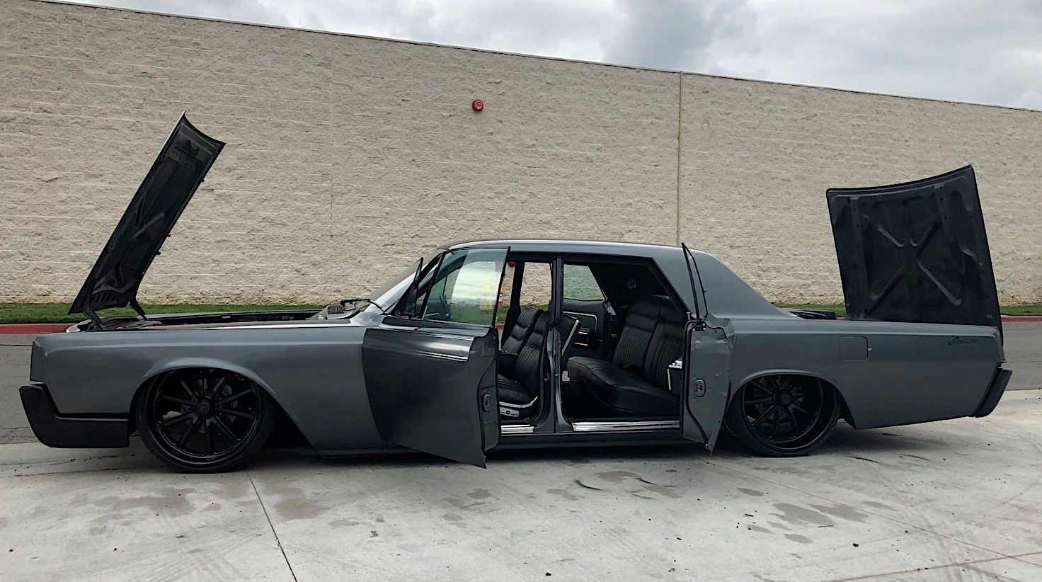 Bagged 1966 Lincoln Continental with all the doors open