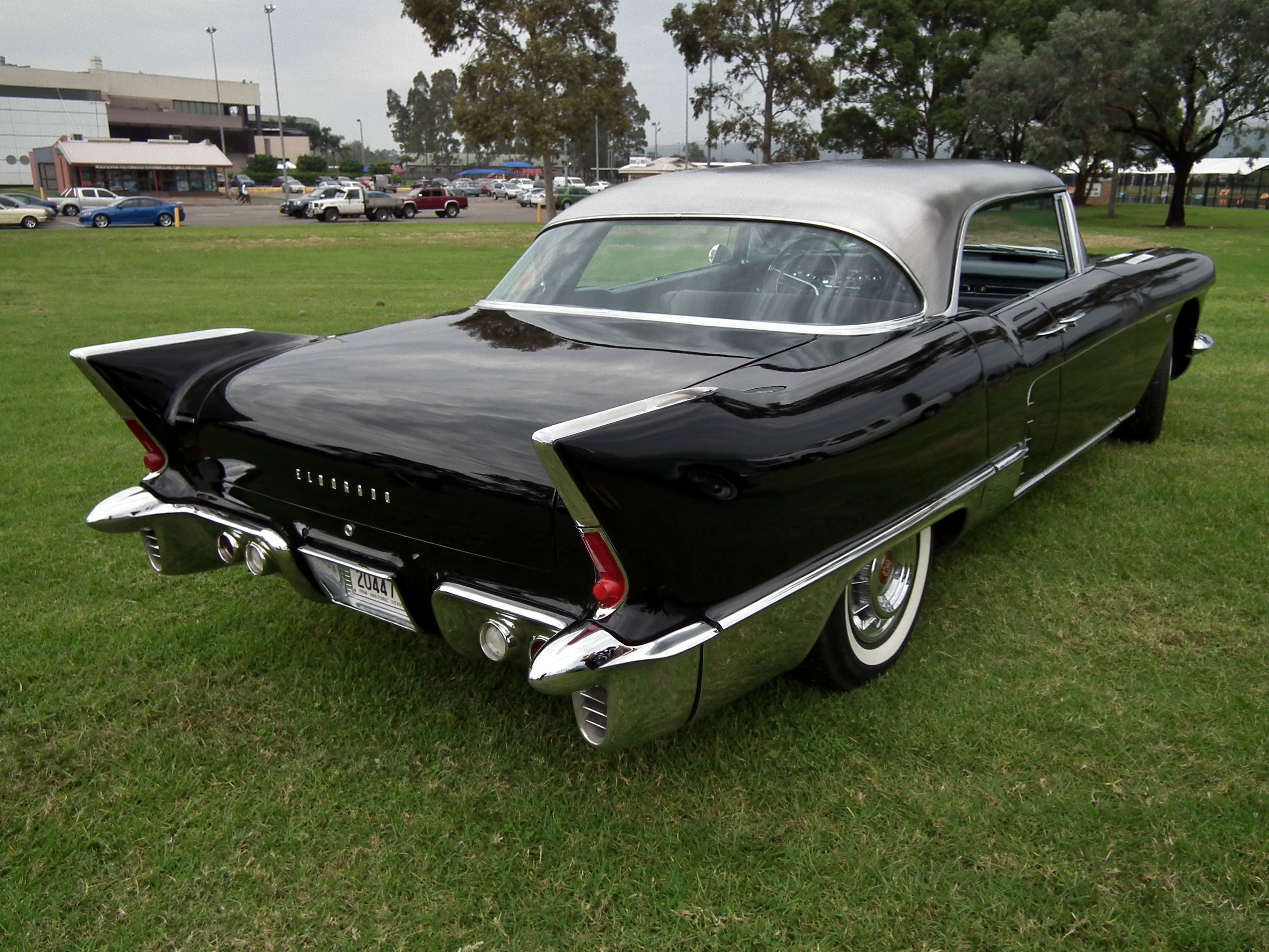 Cadillac Eldorado Brougham parked in a field