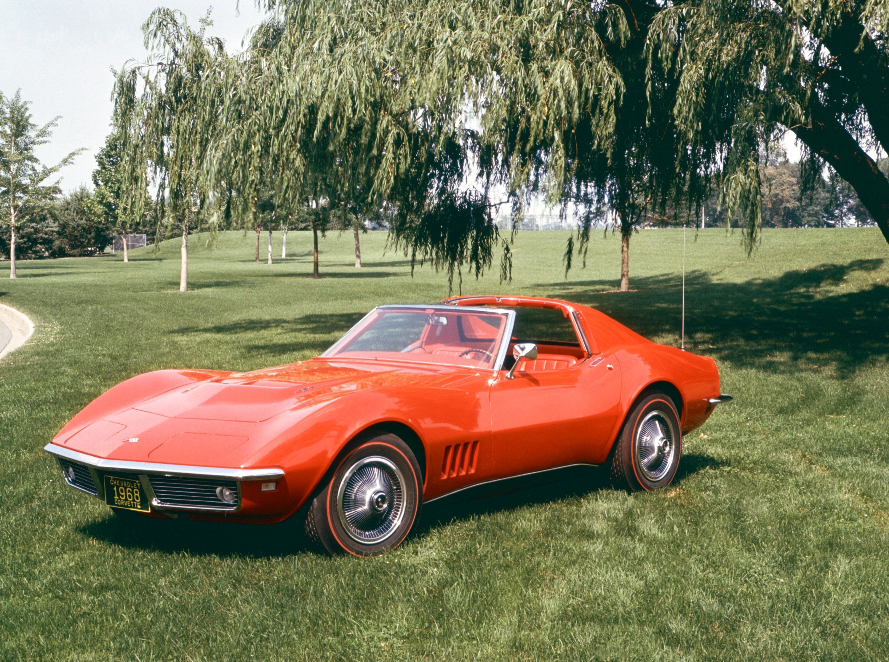 classic Chevrolet Corvette parked on a field