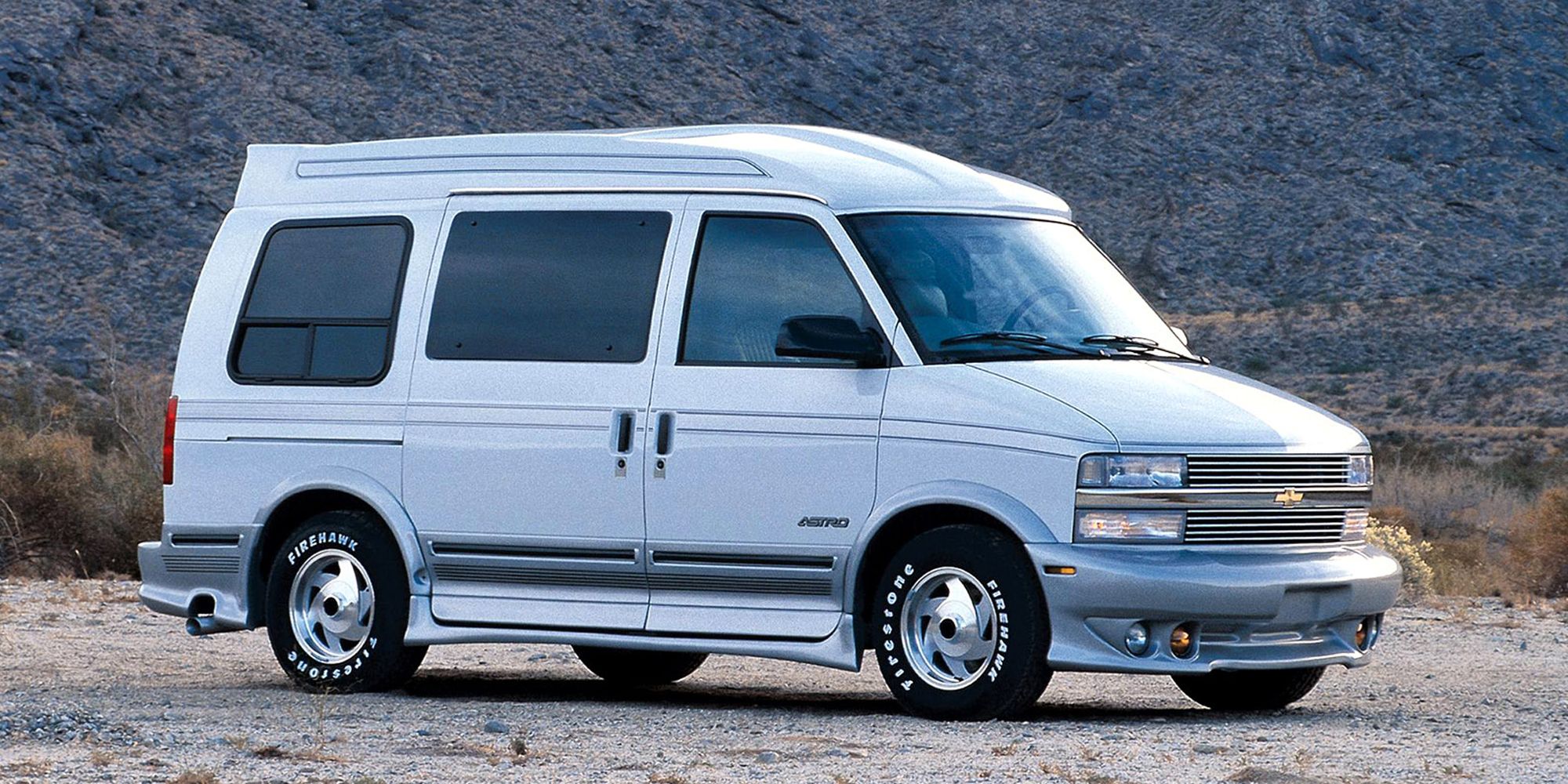 A white Chevy Astro conversion van