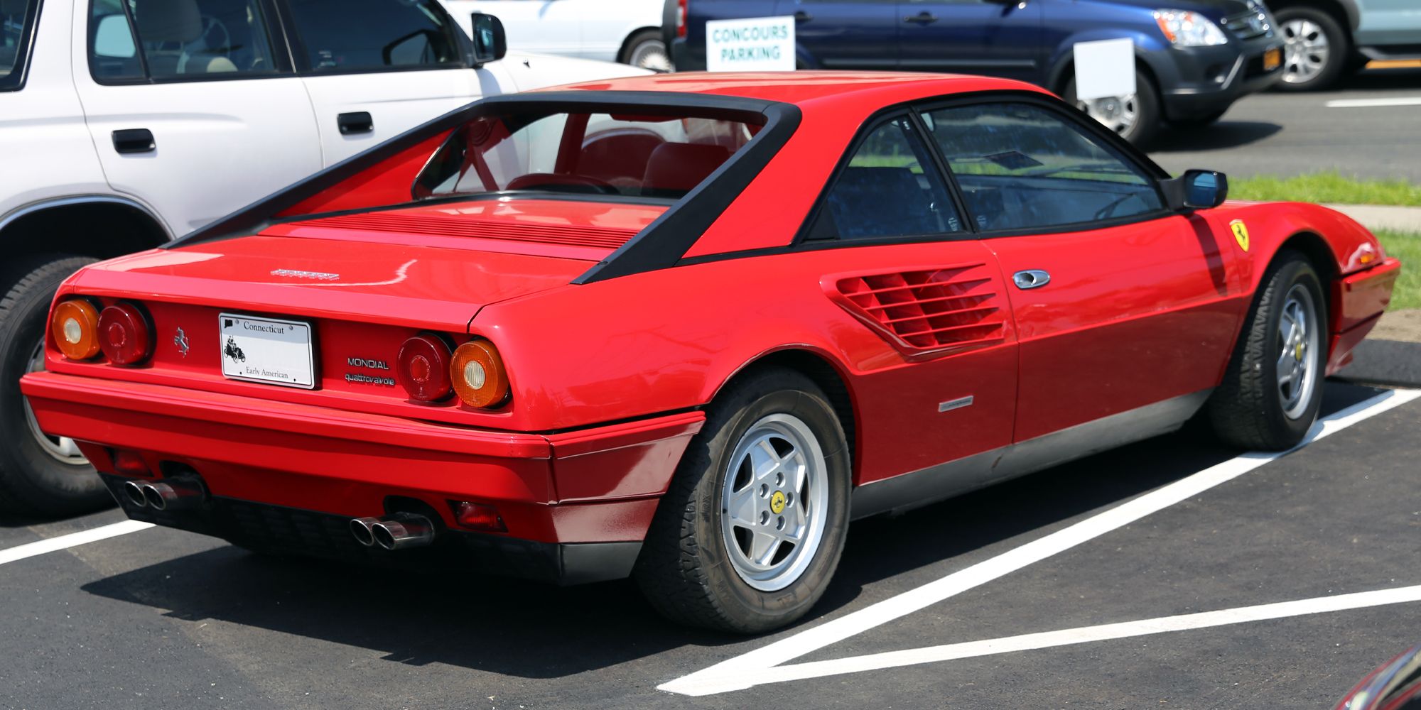 Rear 3/4 view of a red Mondial