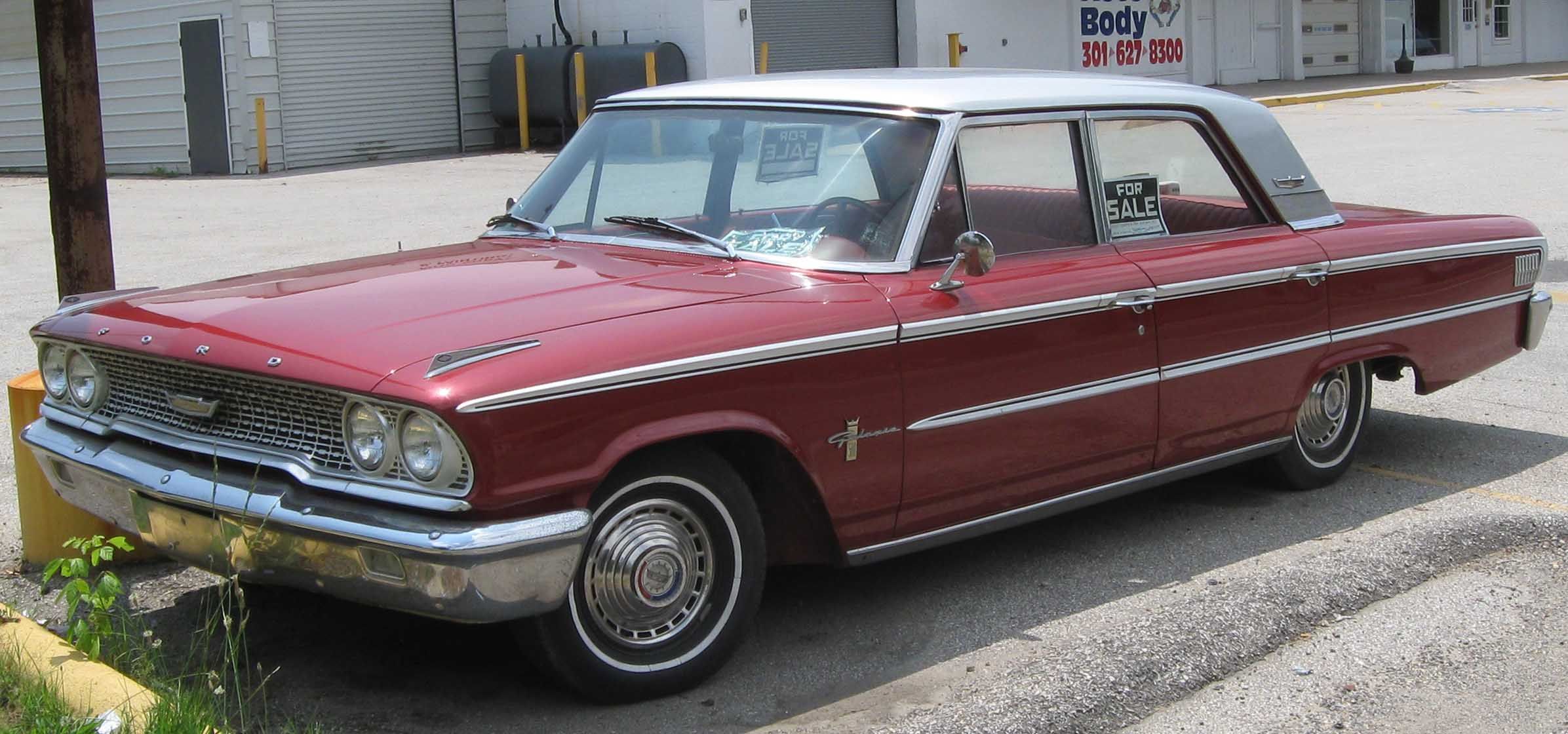 Red Ford Galaxie with white top