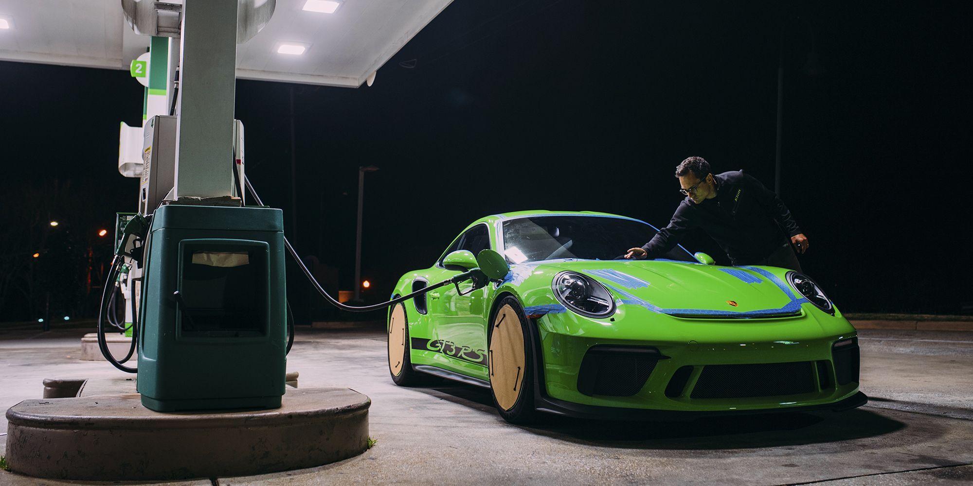 Porsche 911 at a gas station
