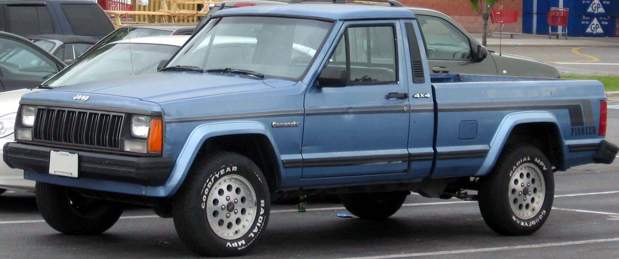 Parked blue Jeep Comanche