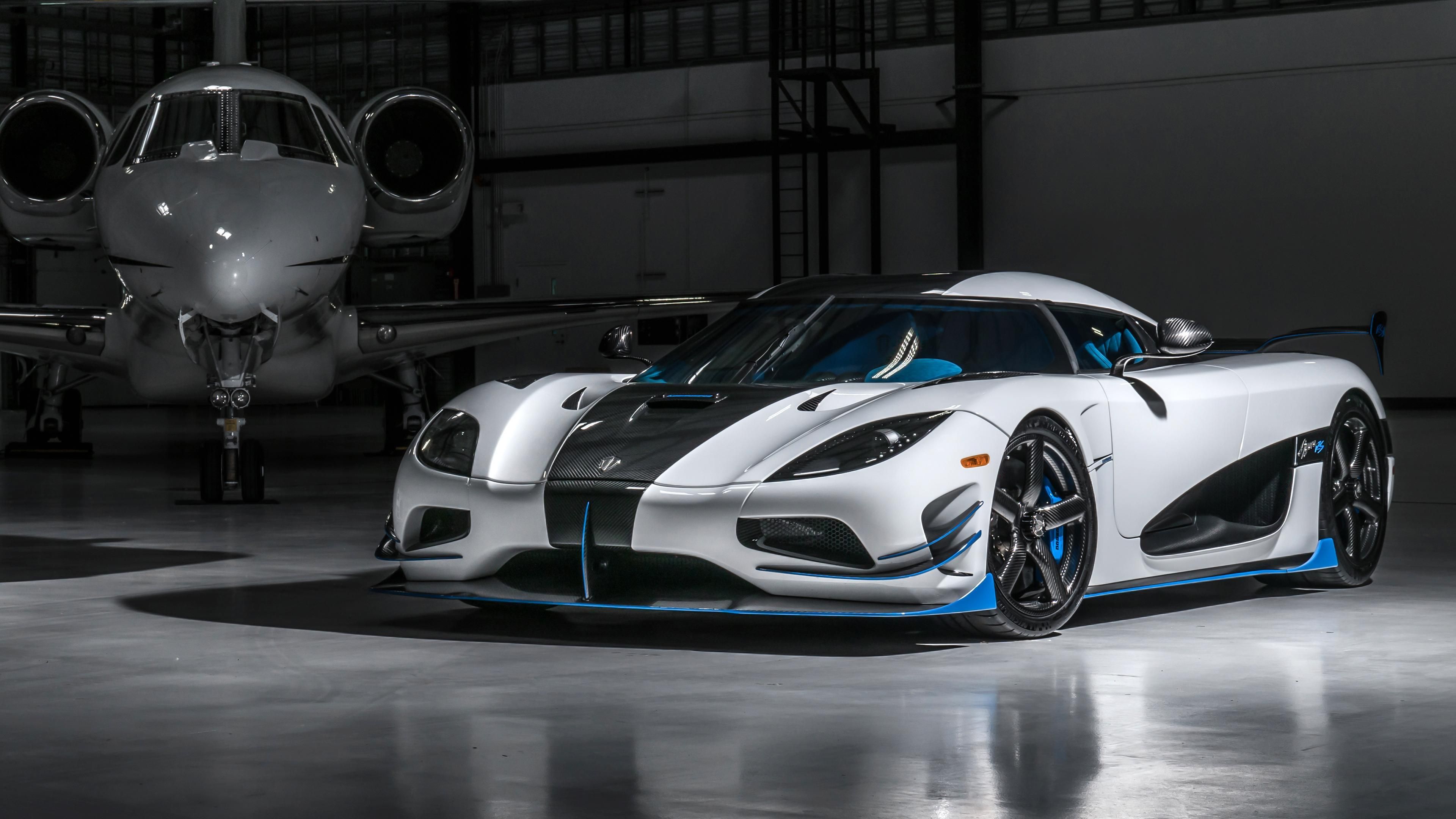 Koenigsegg Agera RS with a plane