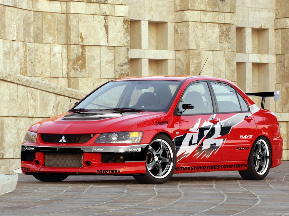 red Mitsubishi Lancer Evolution.
