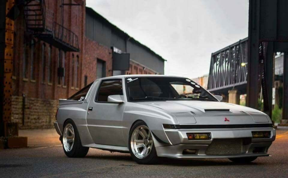 Mitsubishi Starion parked outside